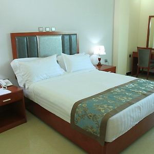 Kamer met een Queen Size Bed